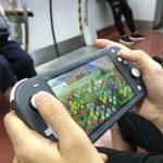 BEIJING, CHINA - JUNE 14: A passenger uses a Nintendo Switch to play video game 'Animal Crossing: New Horizons' on a subway train of Beijing Subway Line 1 on June 14, 2020 in Beijing, China. (Photo by VCG/VCG via Getty Images)